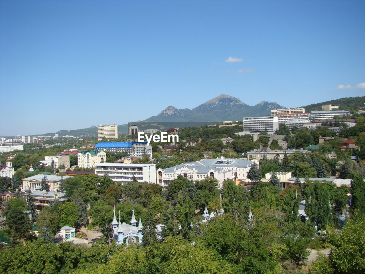 BUILDINGS IN TOWN AGAINST CLEAR SKY