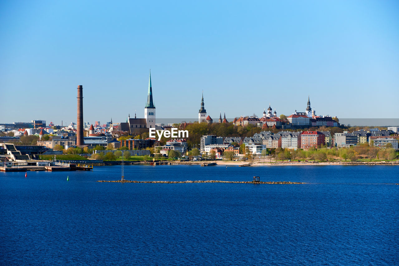 CITY BY SEA AGAINST CLEAR SKY