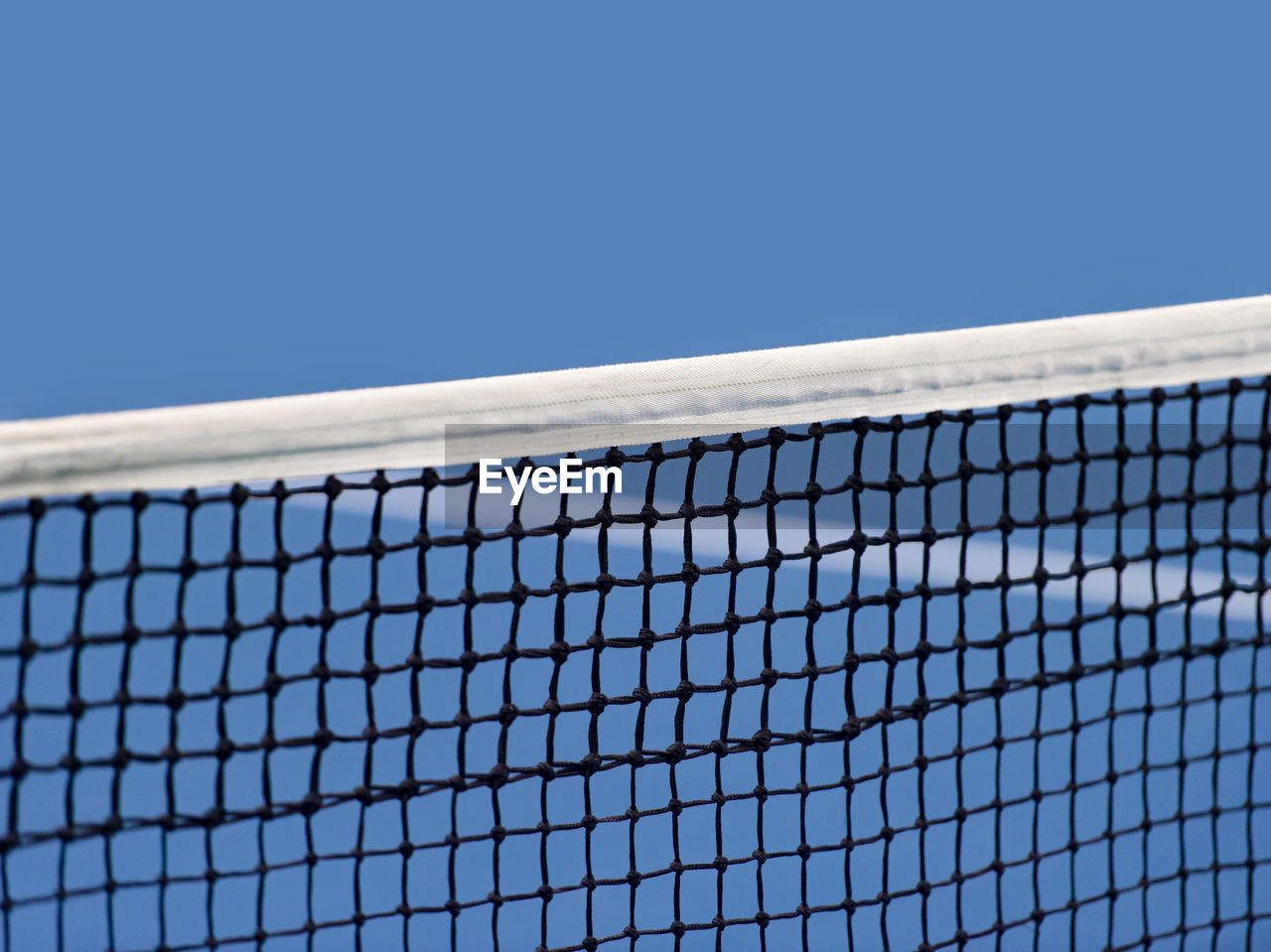 VIEW OF FENCE AGAINST CLEAR BLUE SKY