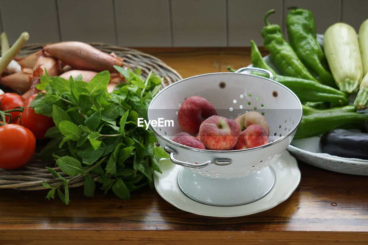 Close-up of fruits in bowl on table