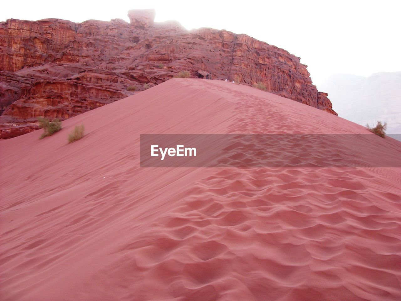 Rock formations in desert against sky