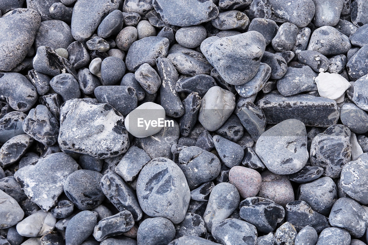 full frame shot of pebbles at beach