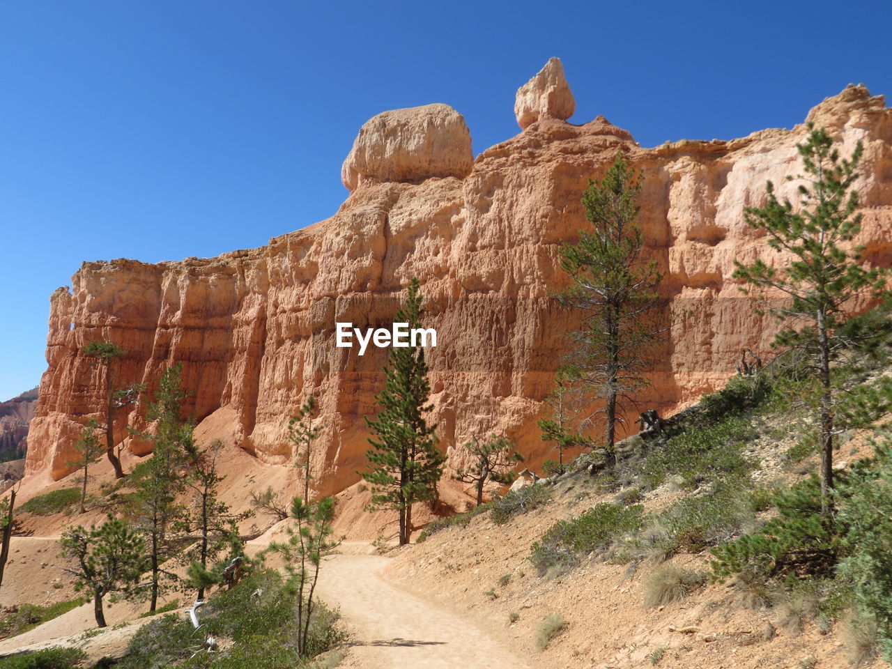 LOW ANGLE VIEW OF ROCK FORMATIONS