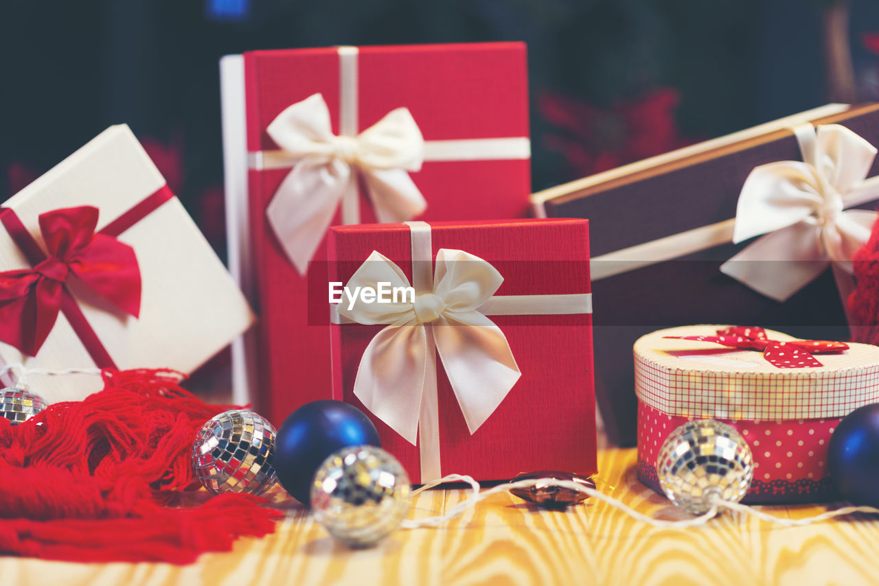 Close-up of christmas presents against black background