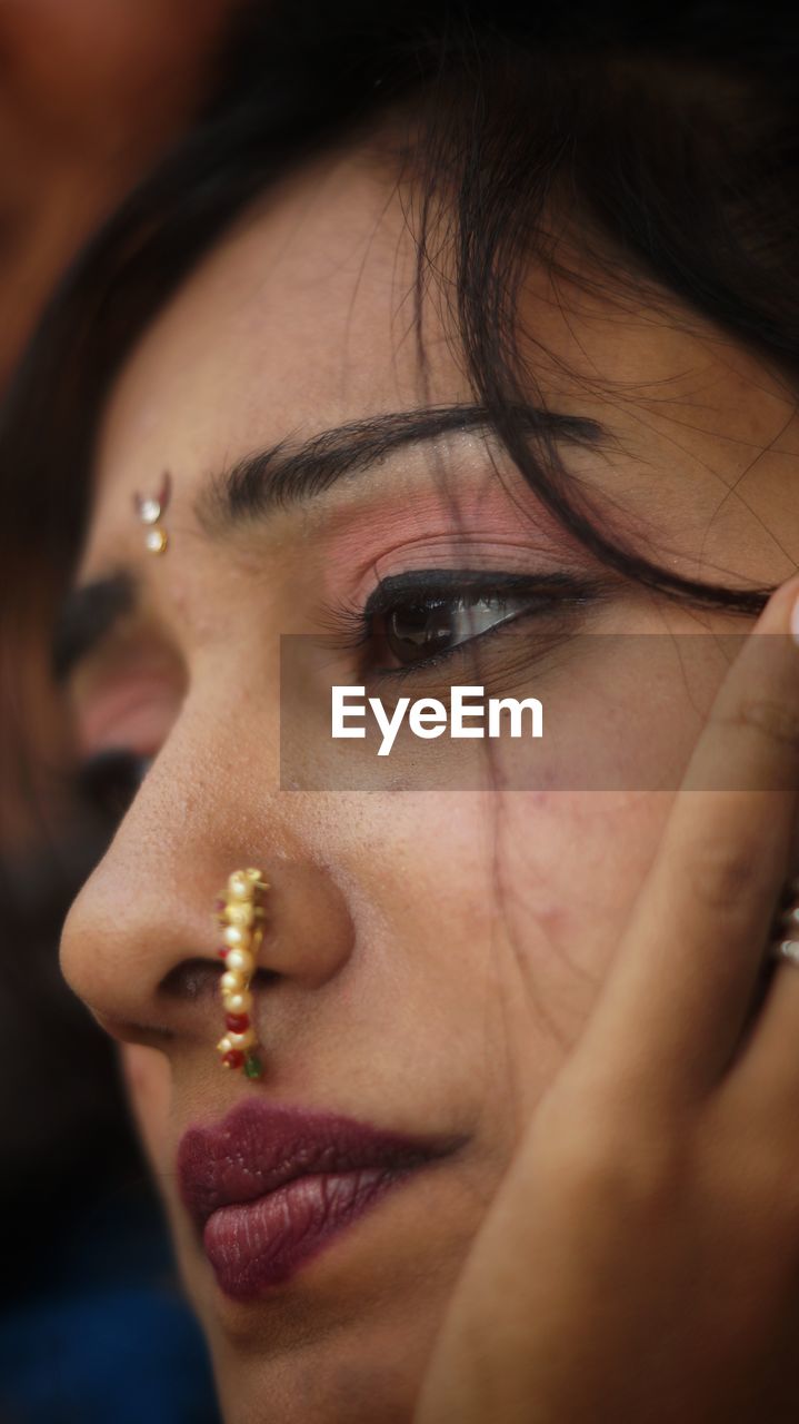 CLOSE-UP PORTRAIT OF WOMAN WITH EYES