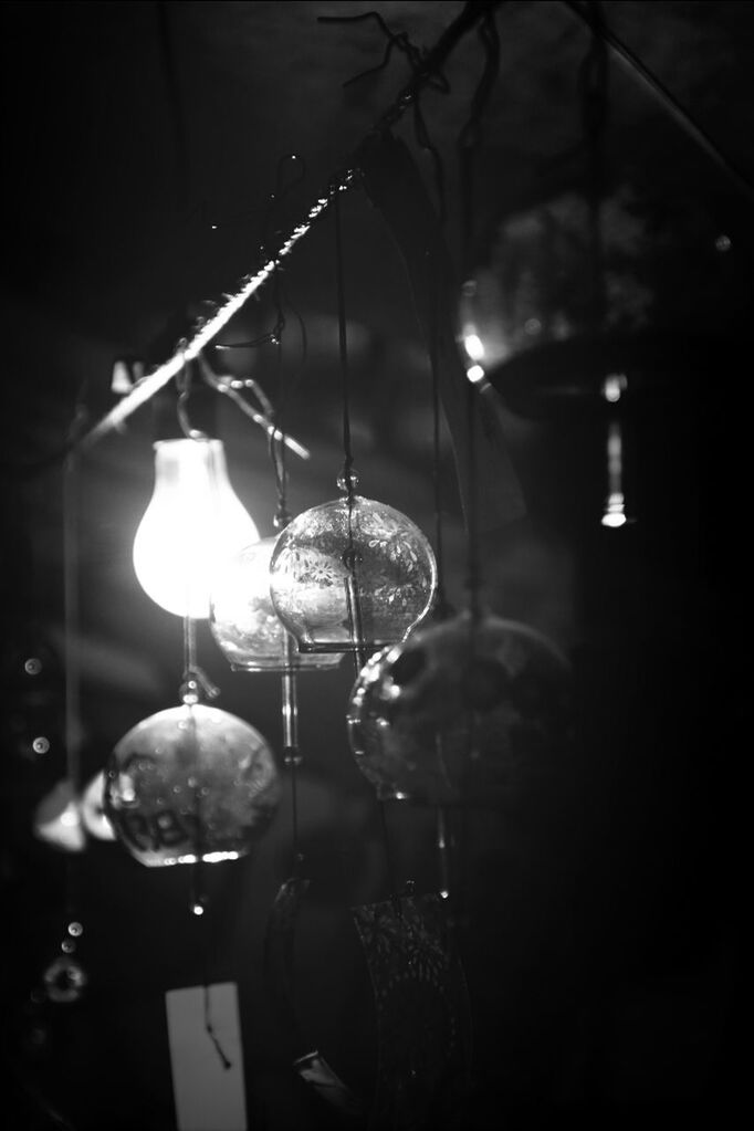 Illuminated light bulb in darkroom