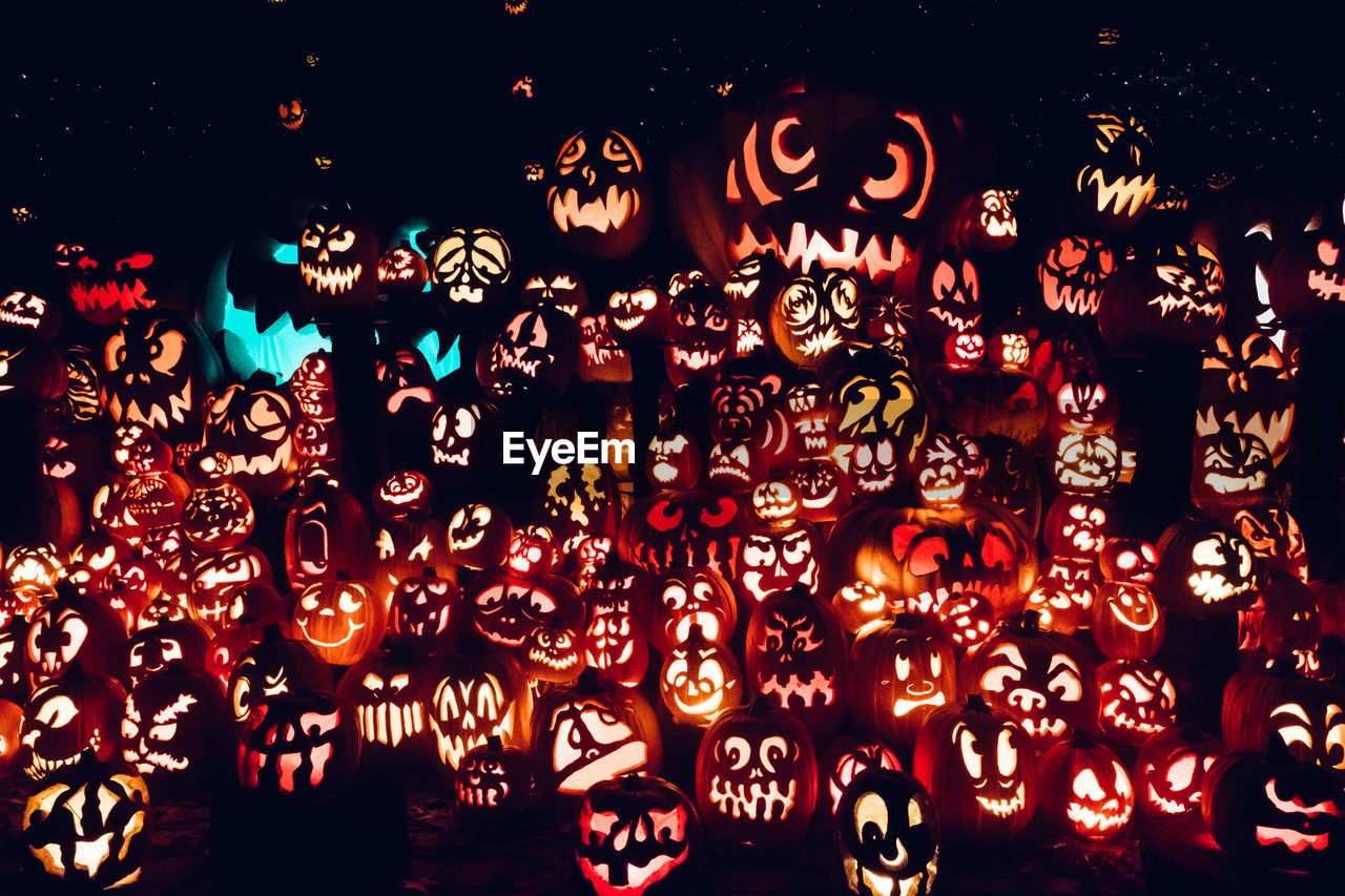 LOW ANGLE VIEW OF ILLUMINATED LANTERNS