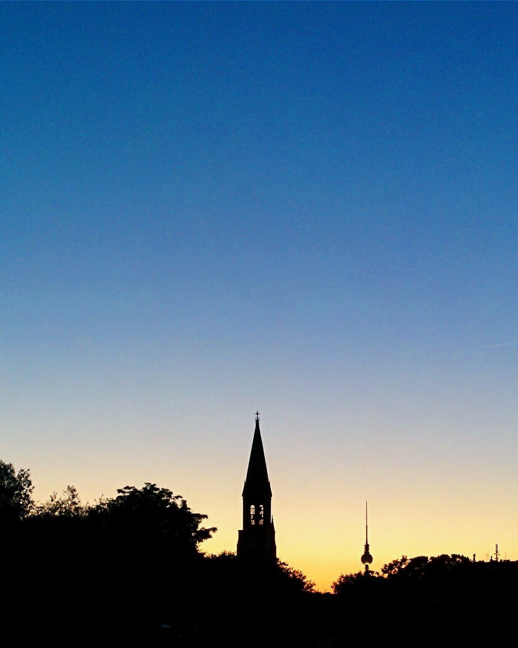 Silhouette of bell tower of a church