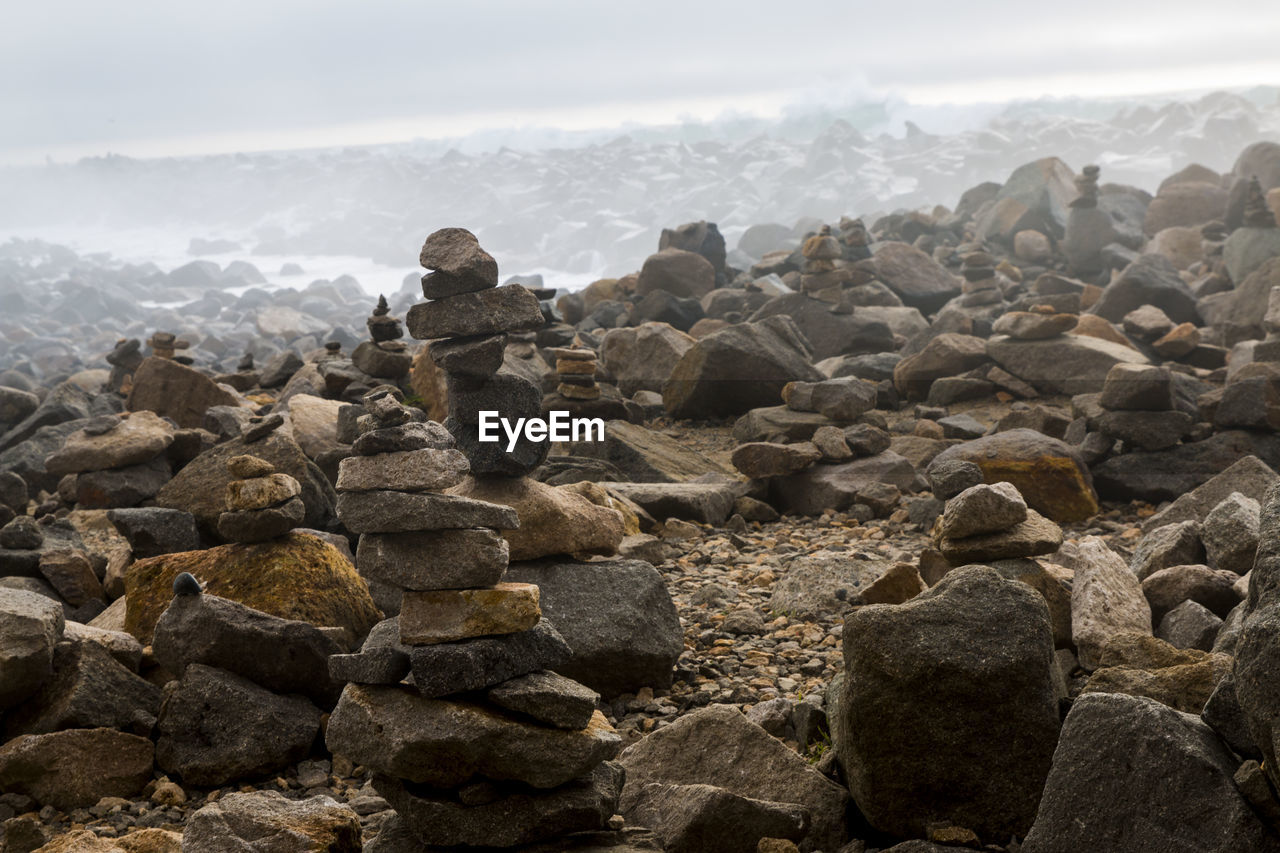 STACK OF STONES IN SEA