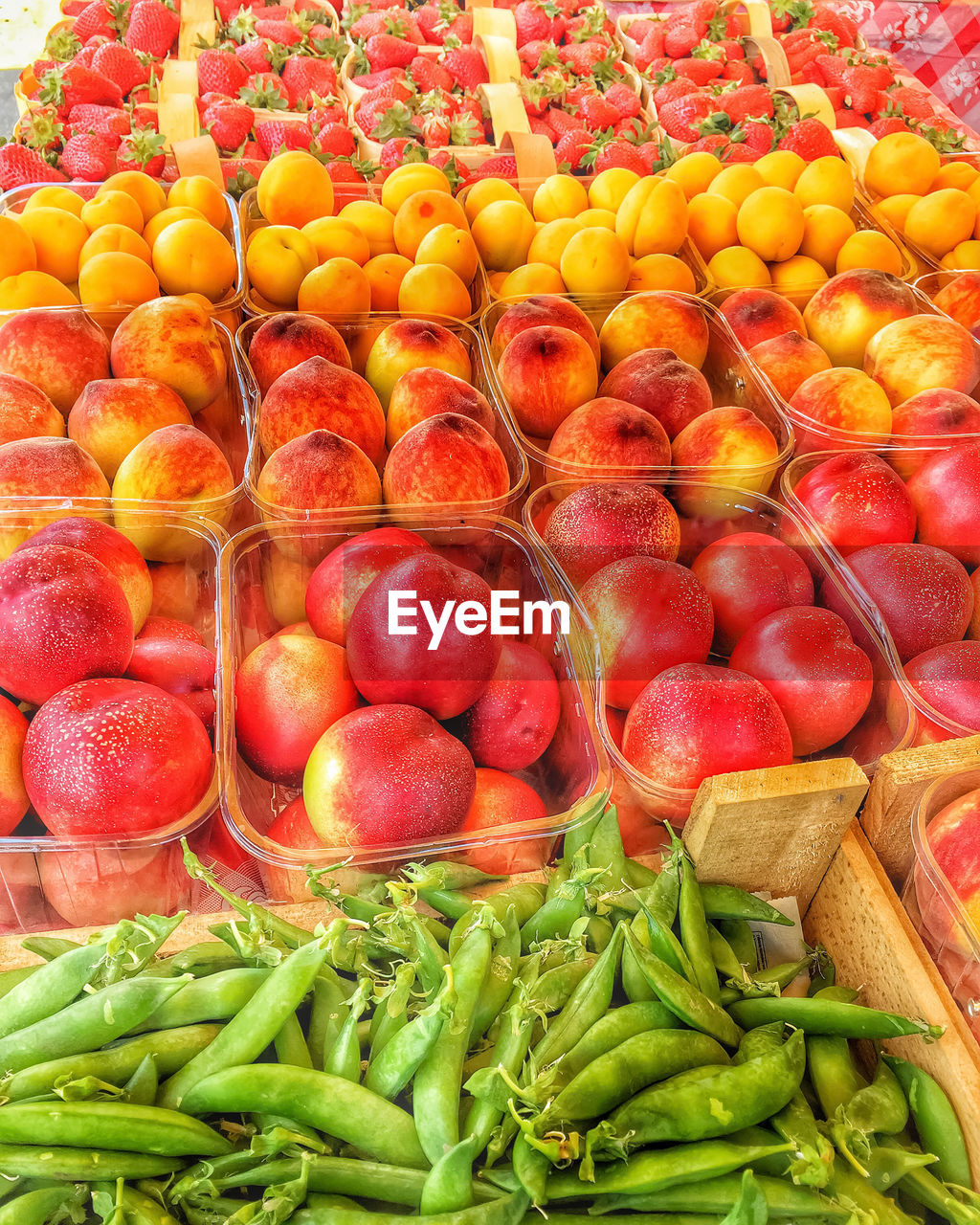 HIGH ANGLE VIEW OF FRUITS FOR SALE AT MARKET STALL