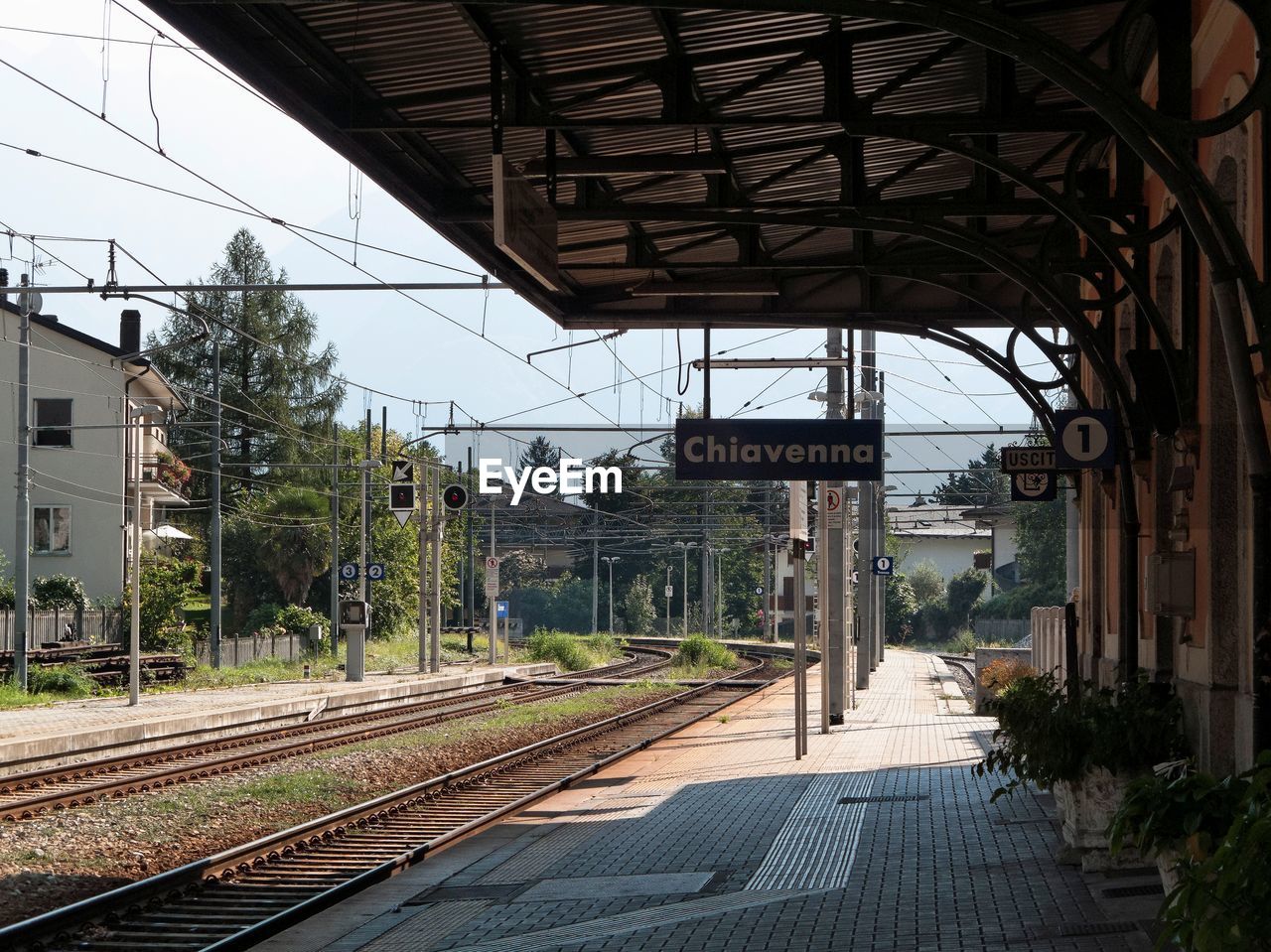 RAILROAD STATION PLATFORM AGAINST SKY