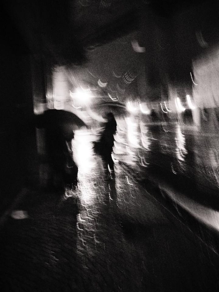 darkness, black, light, white, black and white, motion, night, monochrome, wet, walking, monochrome photography, blurred motion, city, transportation, silhouette, street, men, architecture, adult, lifestyles, rain, illuminated, one person, outdoors, nature, road, full length, water, women, leisure activity