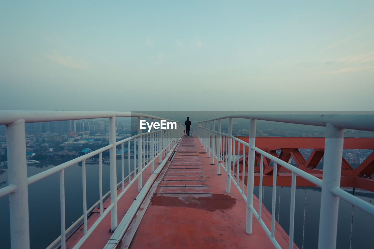 Pier on sea against sky