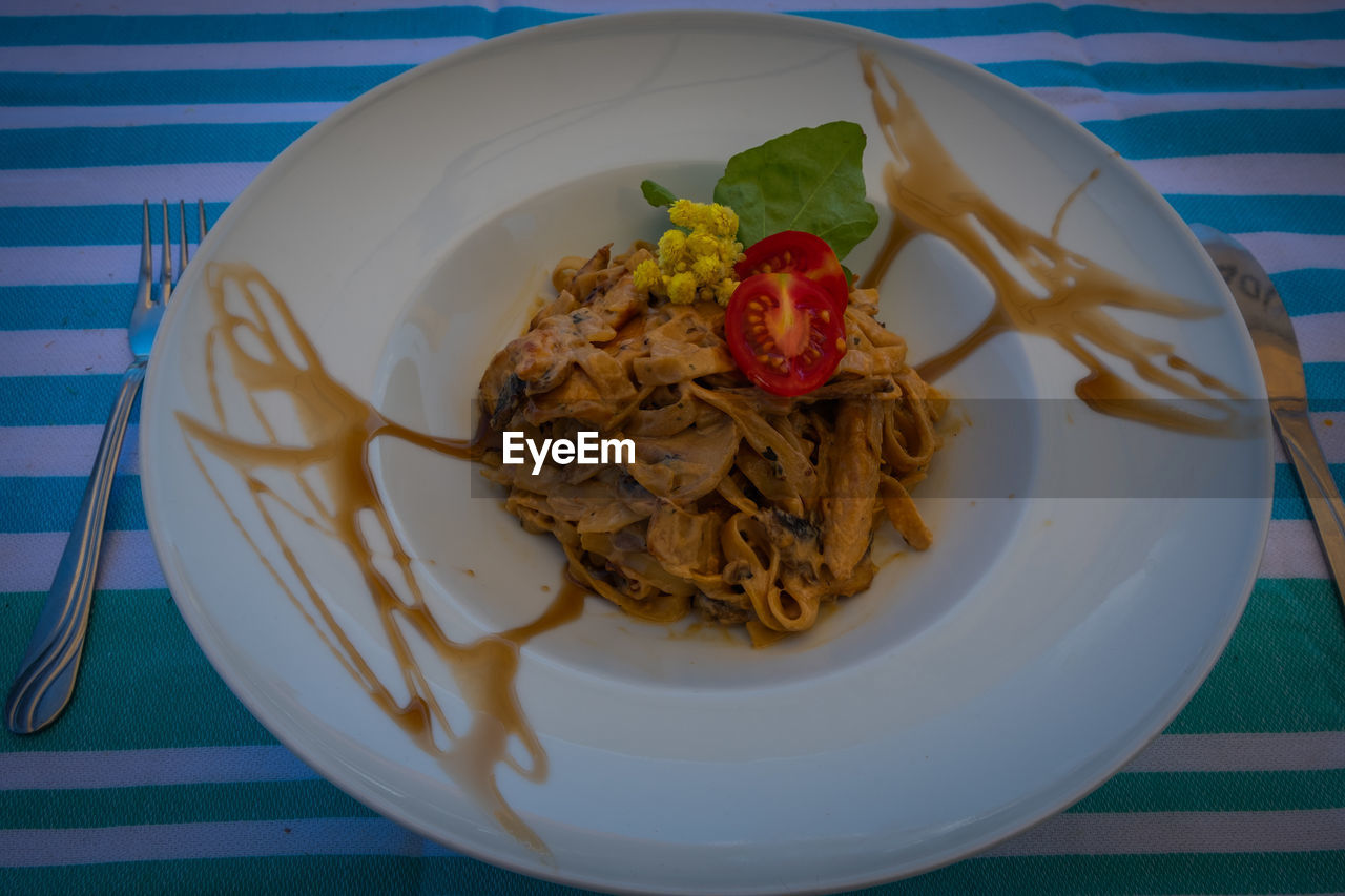 CLOSE-UP OF MEAL SERVED IN PLATE