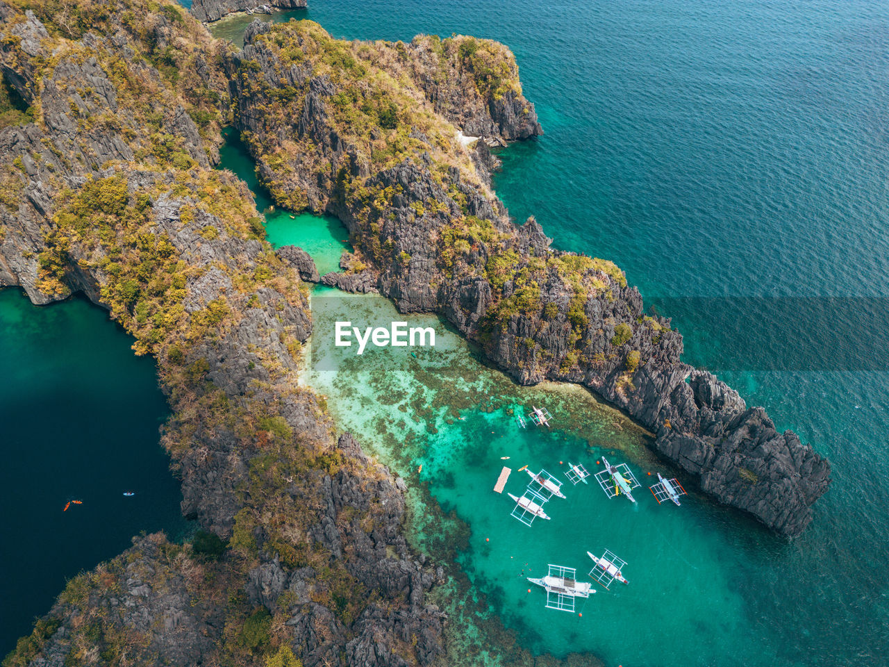 high angle view of rocks in sea