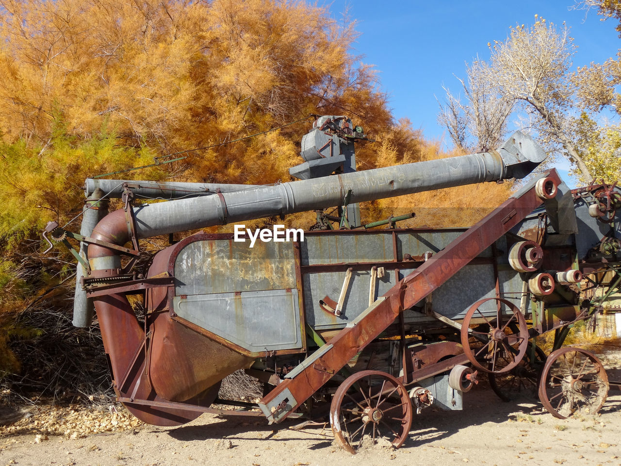 Rusted thresher machine on display in benton, ca