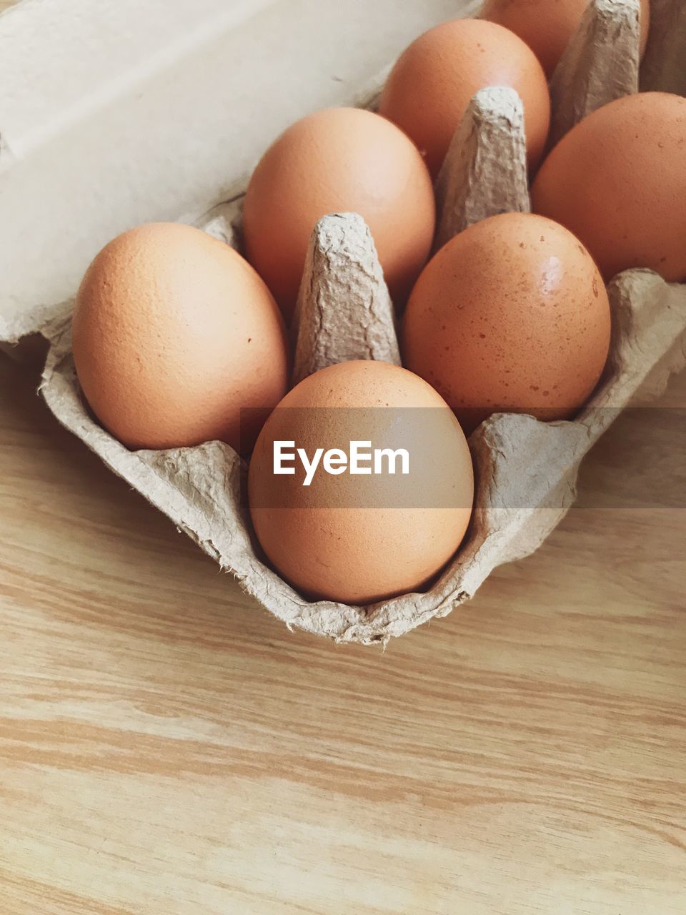 HIGH ANGLE VIEW OF EGGS IN CONTAINER