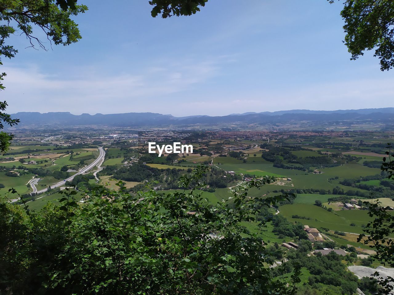 Plana de vic high angle view of trees on landscape against sky