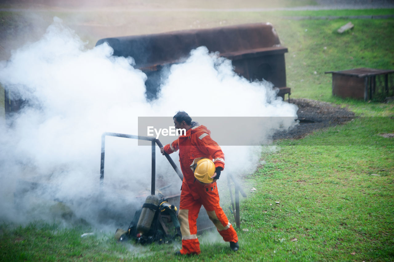 Man working on fire