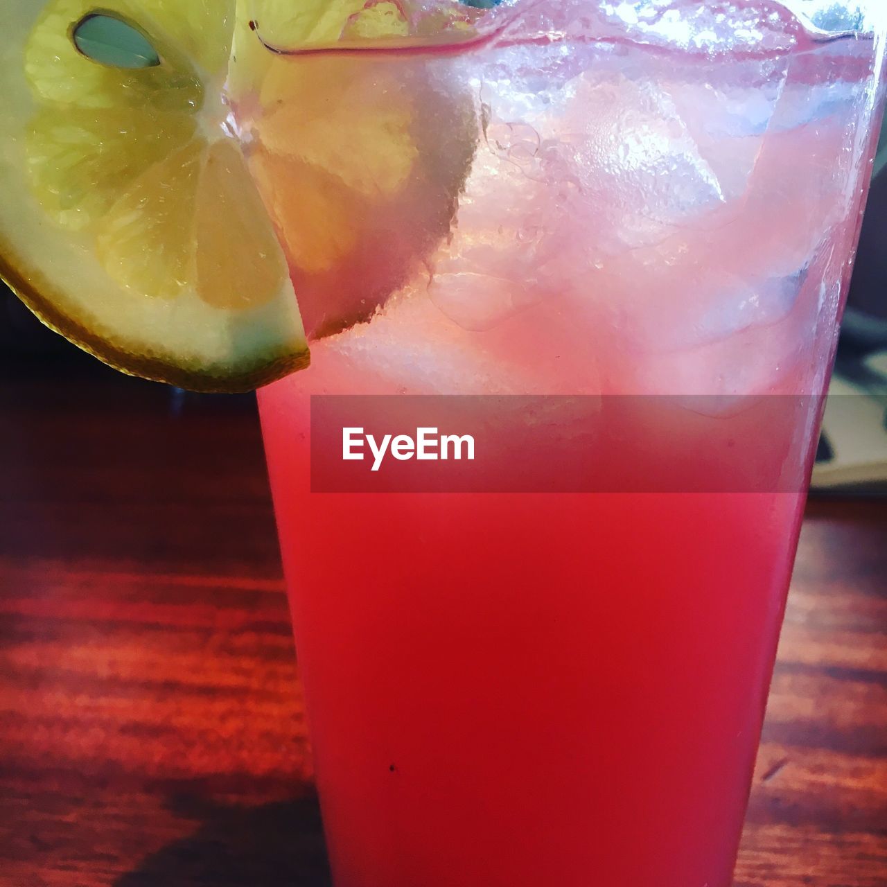 CLOSE-UP OF DRINK ON ICE CUBES