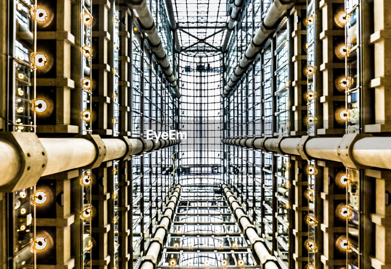 Full frame shot of metallic built structure against sky