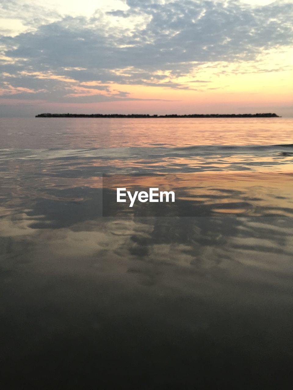 SCENIC VIEW OF SEA DURING SUNSET