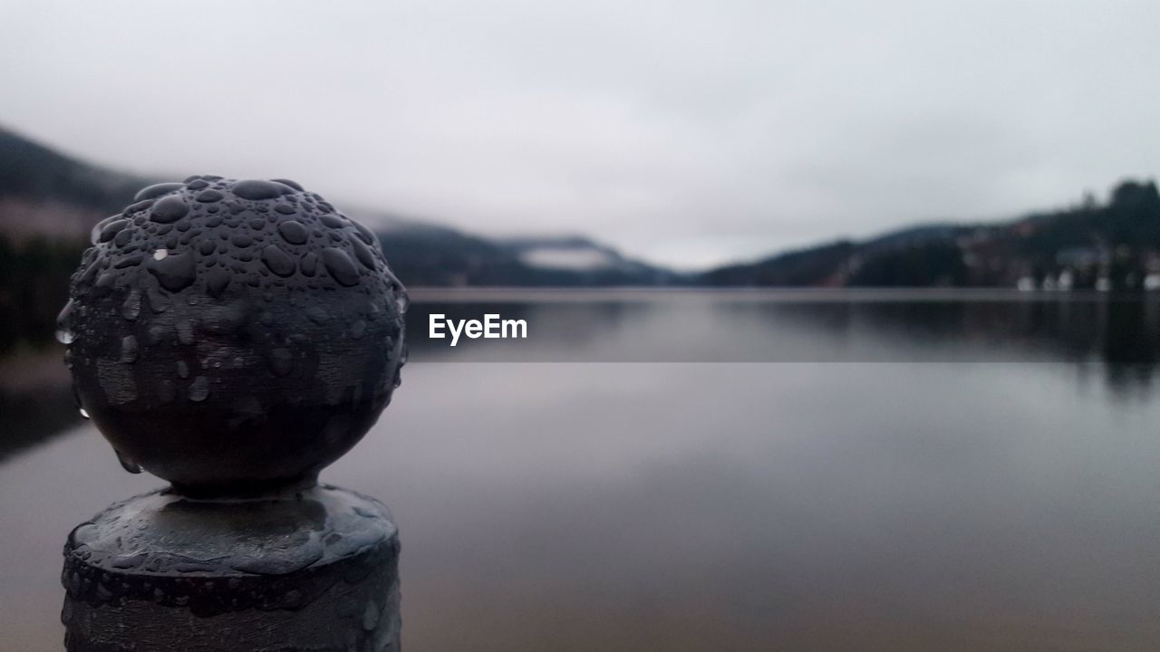 CLOSE-UP VIEW OF LAKE AGAINST SKY