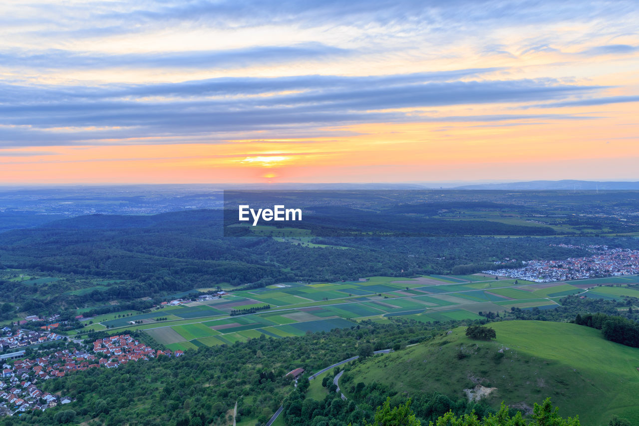 Scenic view of landscape against sky during sunset