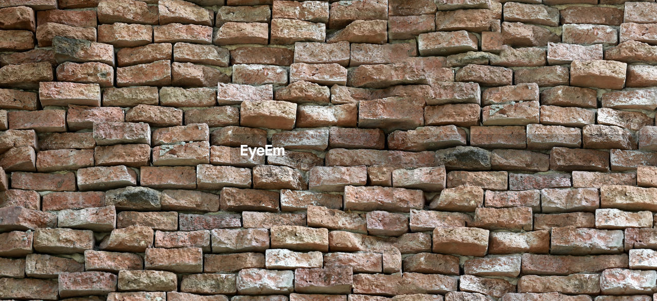 brickwork, brick, stone wall, backgrounds, wall, full frame, architecture, pattern, built structure, textured, wall - building feature, no people, brick wall, large group of objects, repetition, stone material, construction material, abundance, arrangement, day, in a row, outdoors, rough, stone, construction industry, brown, industry, old, nature, building exterior, close-up