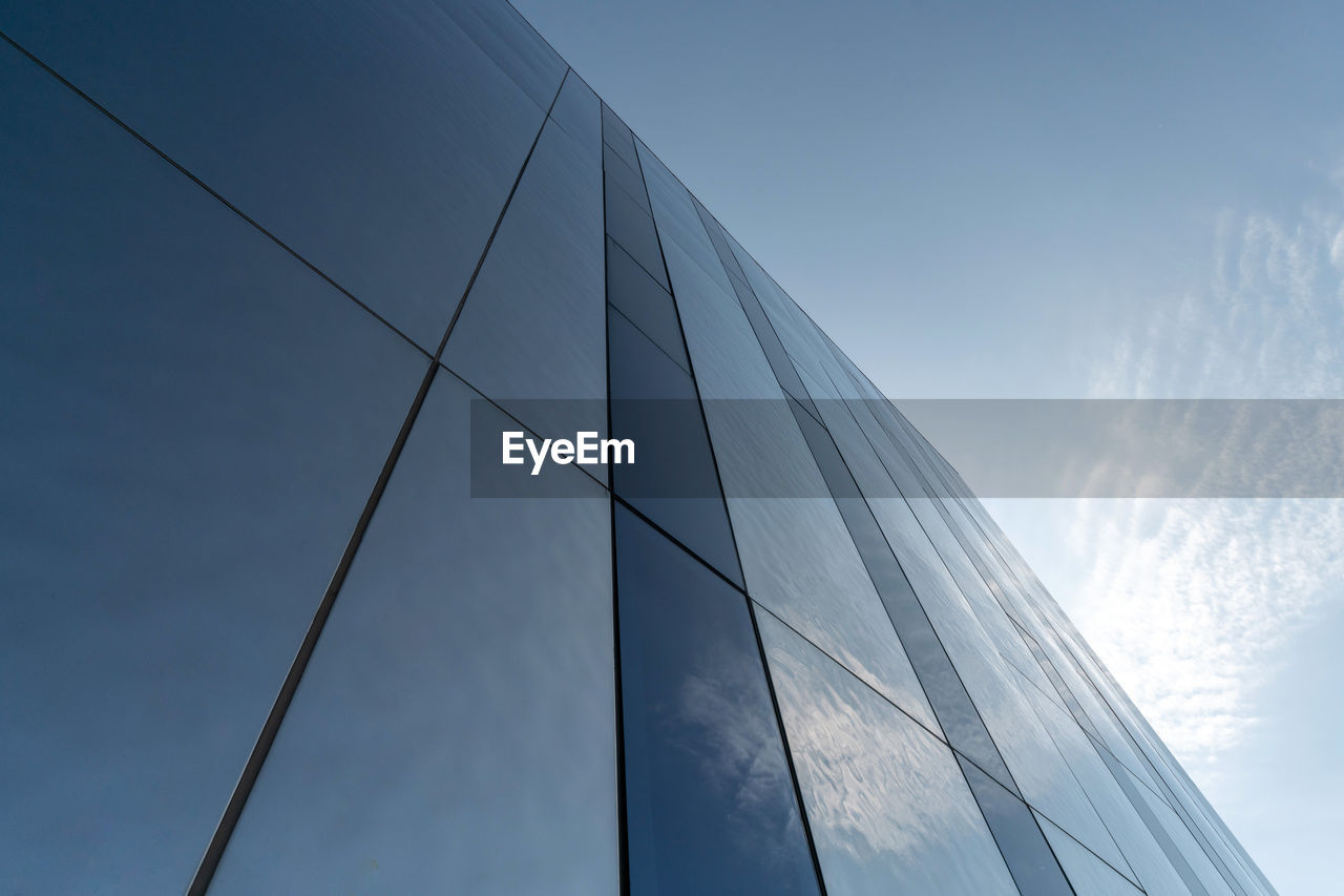 Low angle view of modern building against sky