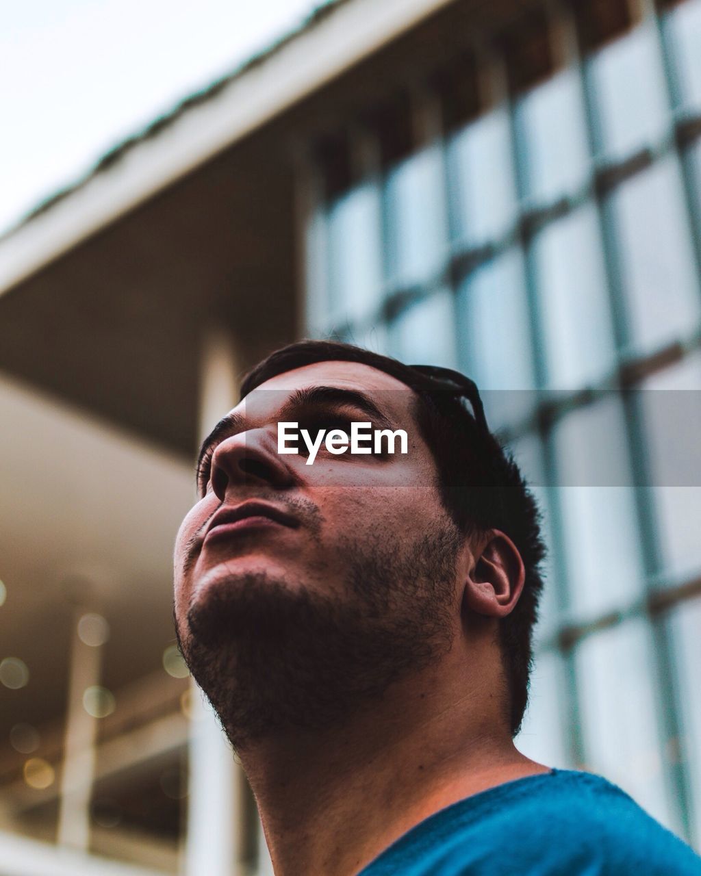 CLOSE-UP OF MAN WITH EYES CLOSED