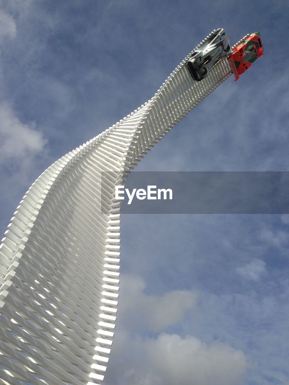 LOW ANGLE VIEW OF MODERN OFFICE BUILDING AGAINST SKY