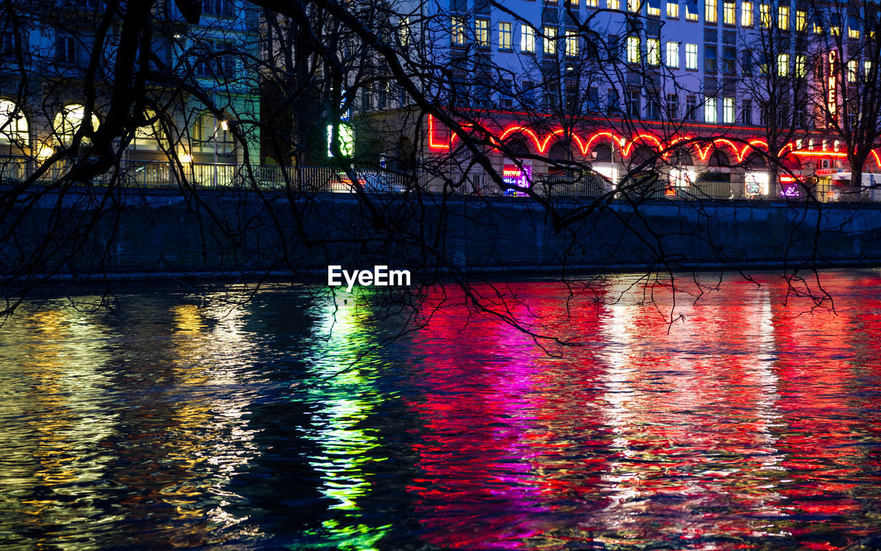 REFLECTION OF BUILDINGS IN WATER