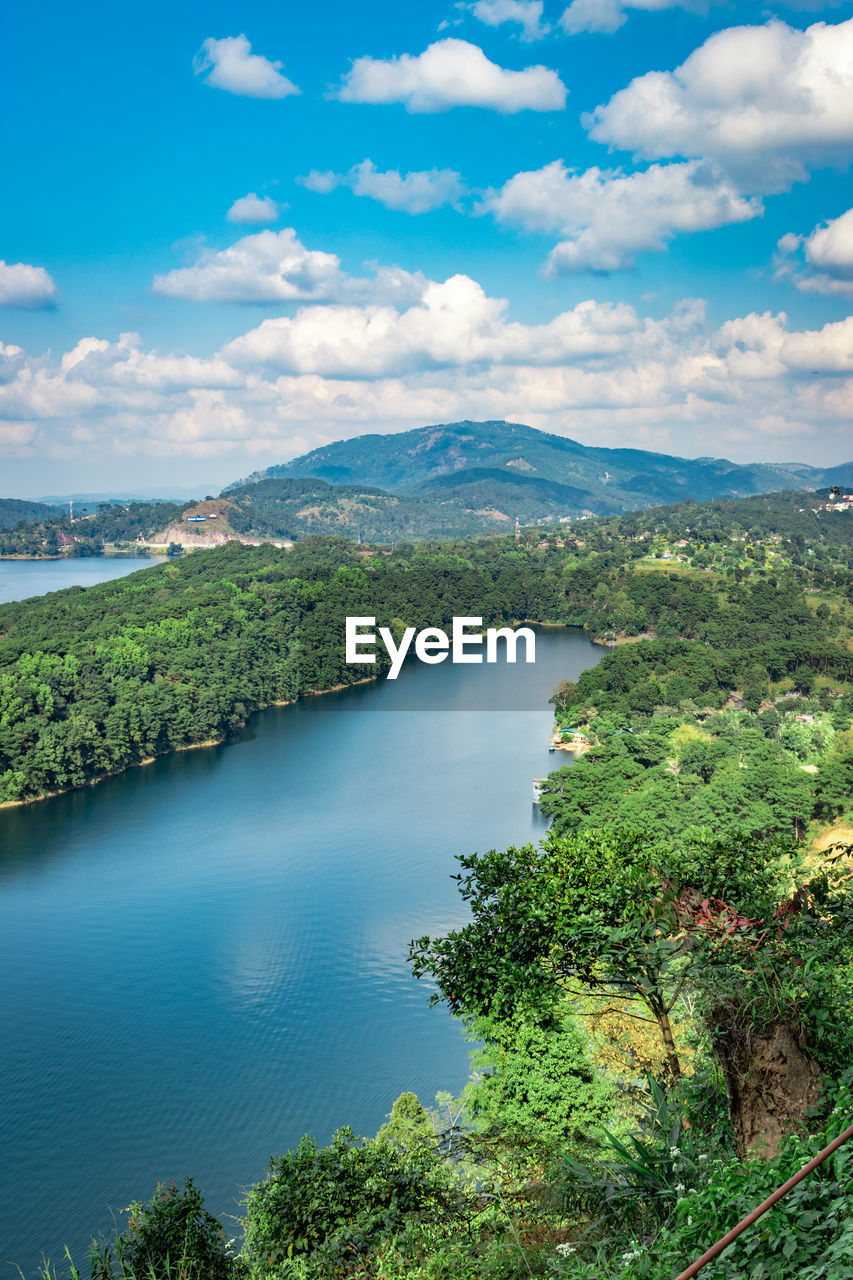 Serene lake with mountain background at day from top angle