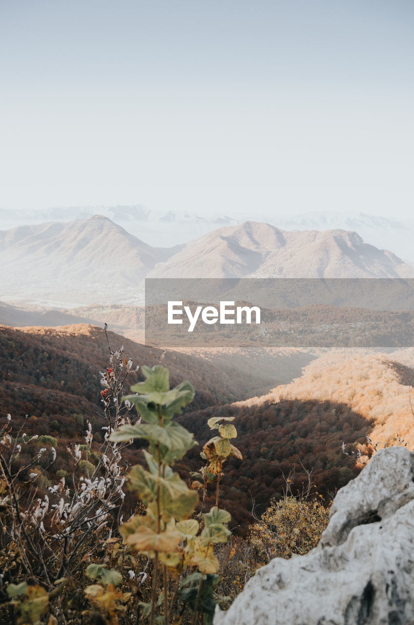 Scenic view of mountains against clear sky