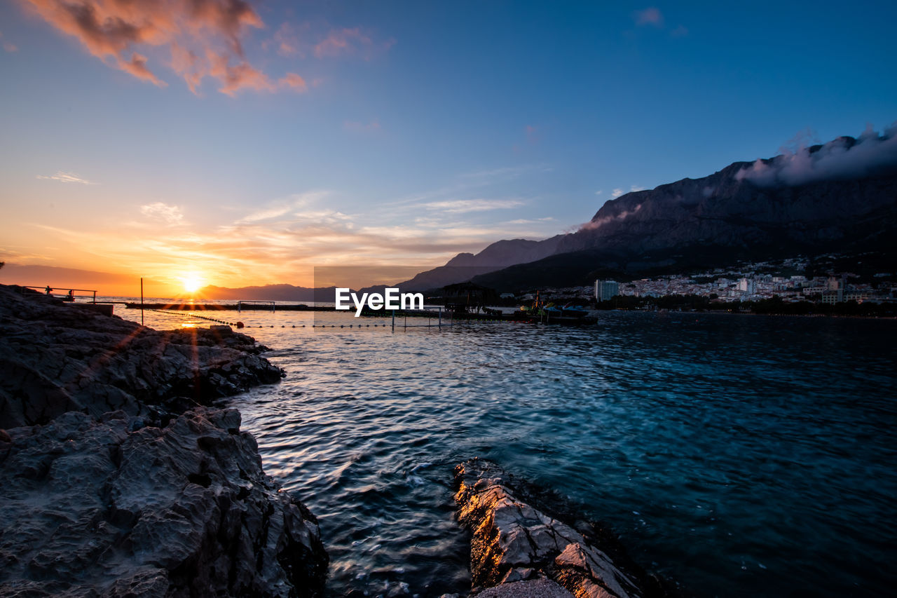 Scenic view of sea against sky during sunset