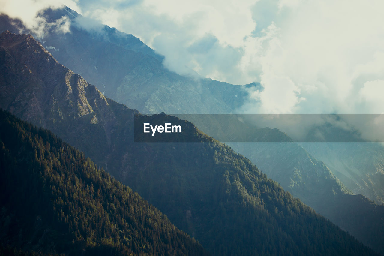 PANORAMIC SHOT OF MOUNTAINS AGAINST SKY