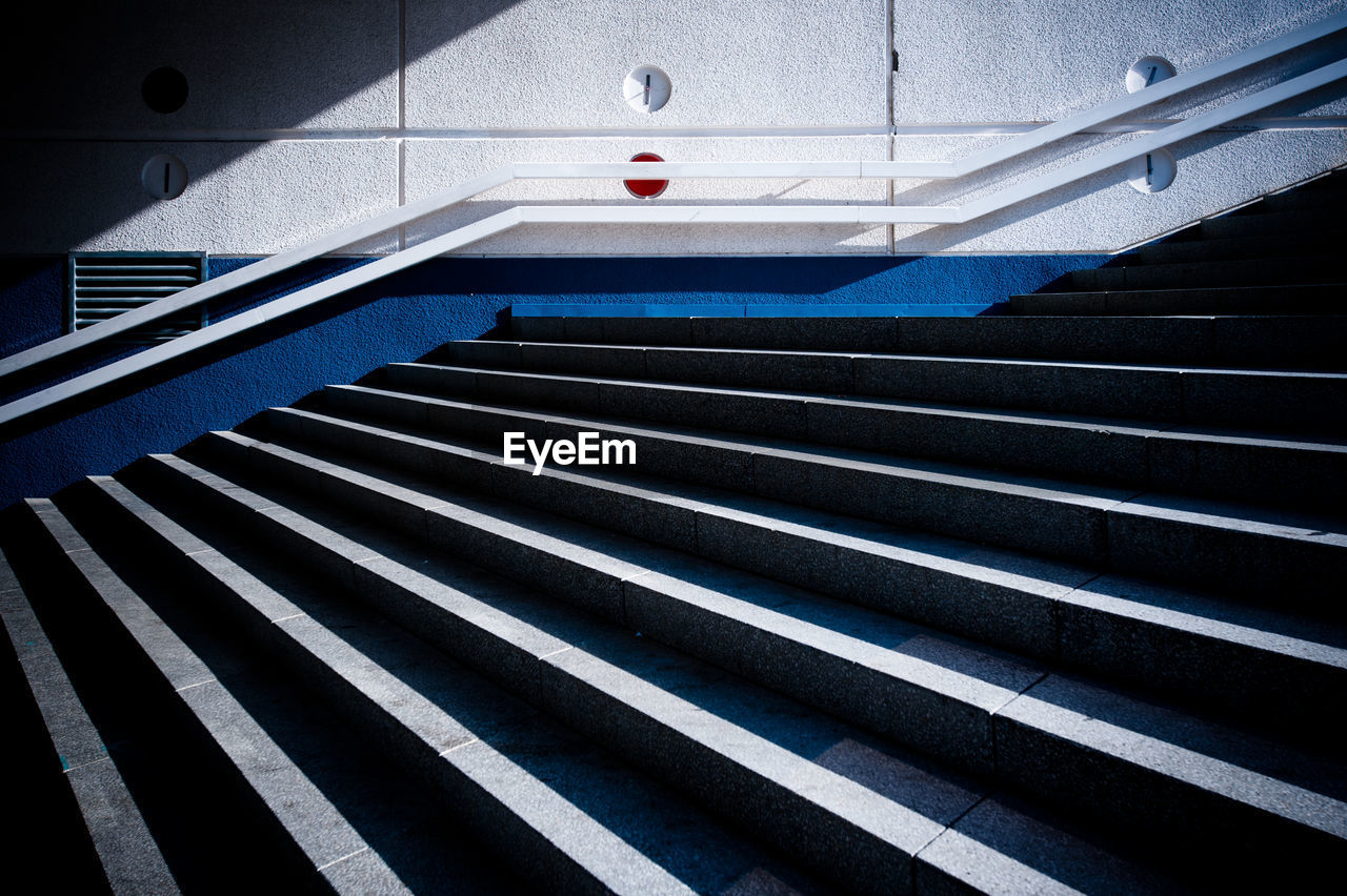 Empty staircase against wall