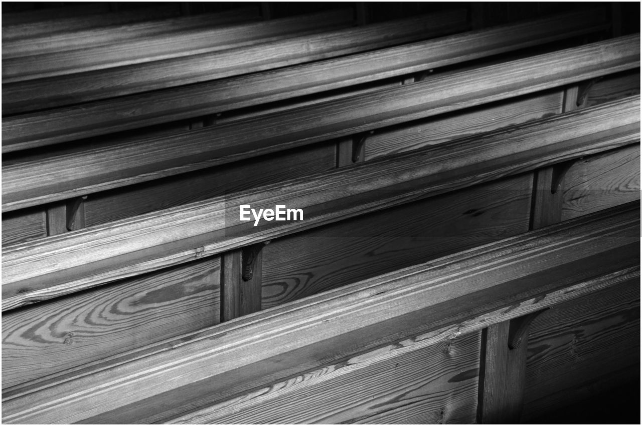 FULL FRAME SHOT OF STACK OF WOOD