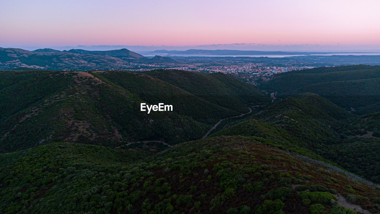SCENIC VIEW OF LANDSCAPE DURING SUNSET