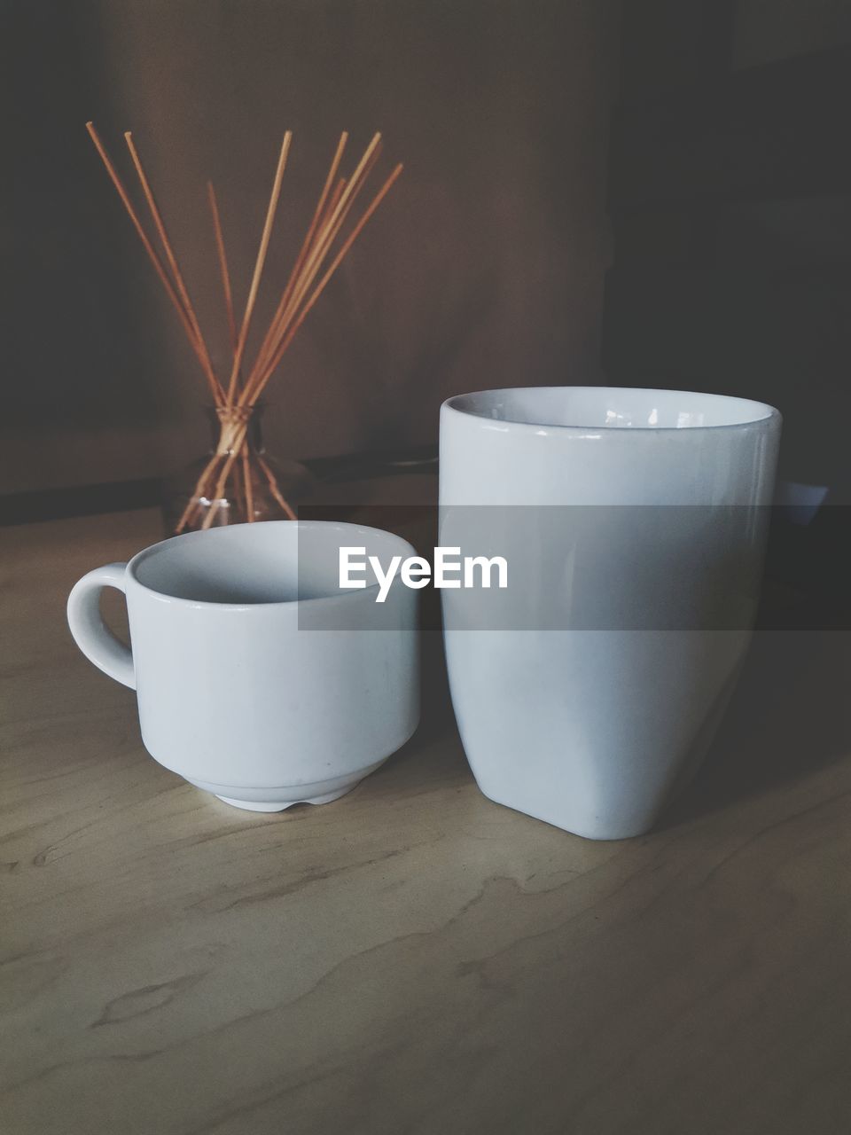 cup, food and drink, ceramic, indoors, no people, lighting, coffee cup, mug, food, still life, wood, flowerpot, table, drink, wellbeing, tableware, close-up, white, nature, freshness, simplicity