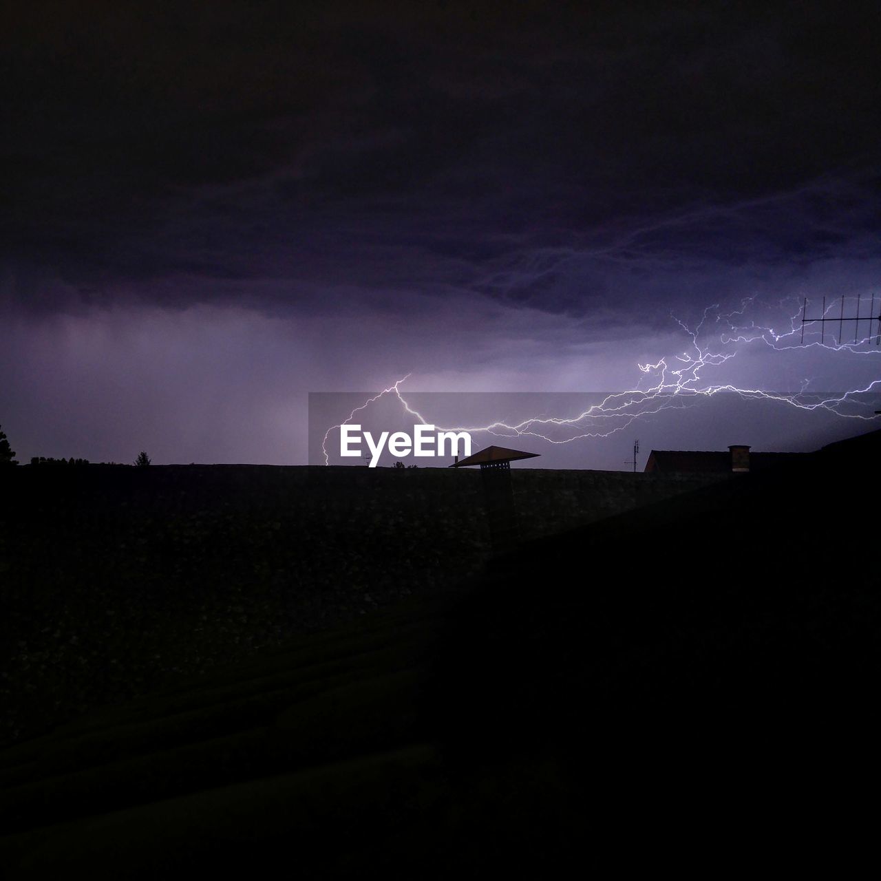 LIGHTNING OVER LANDSCAPE