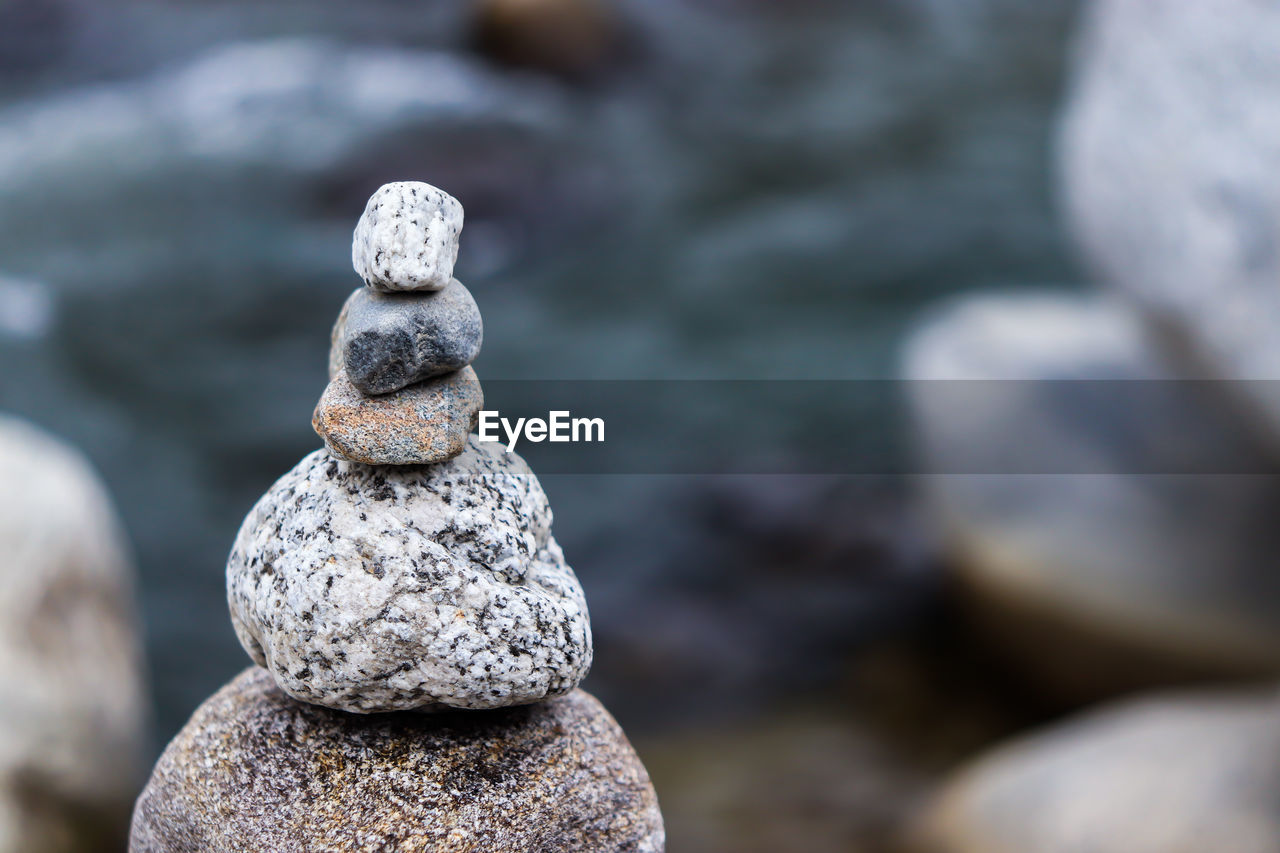 Close-up of stone stack on rock