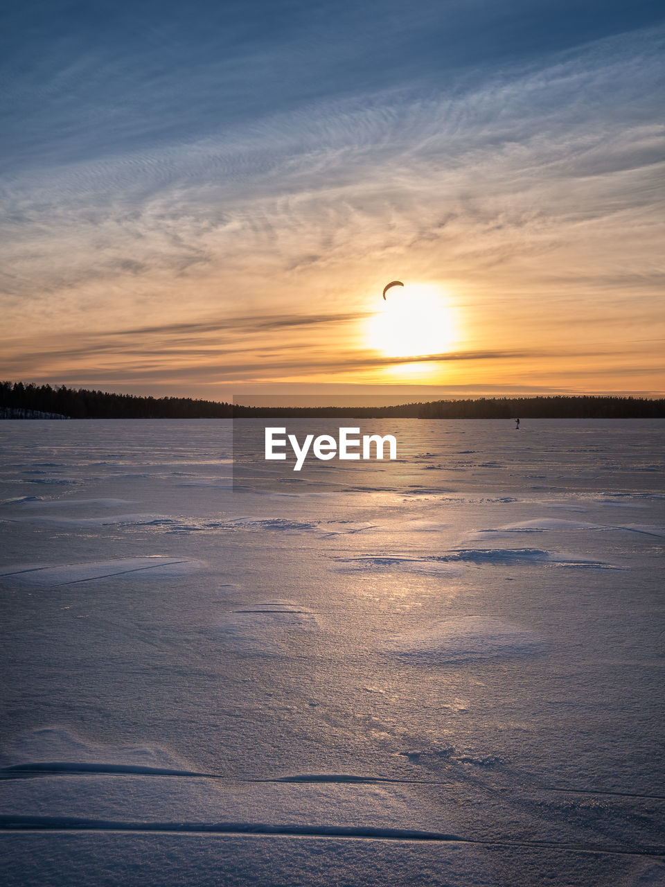 SCENIC VIEW OF SUNSET OVER SEA