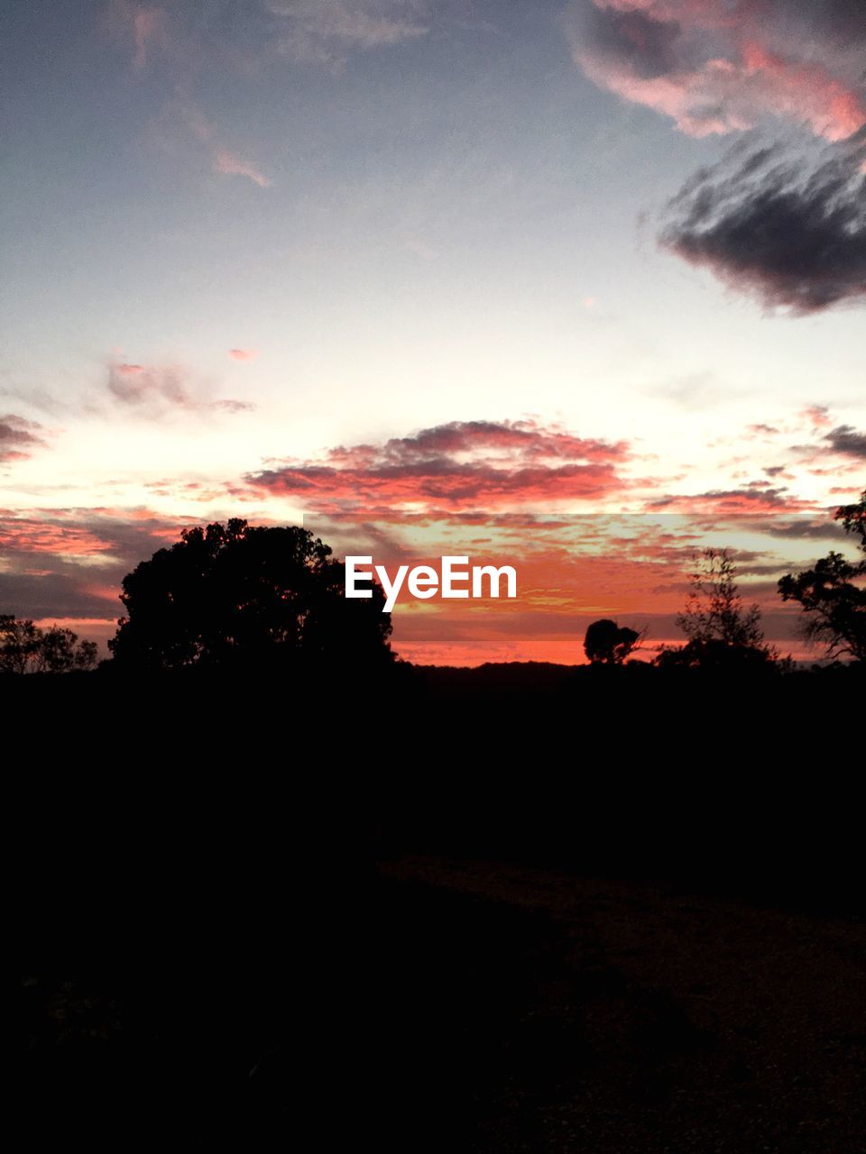 SCENIC VIEW OF SILHOUETTE LANDSCAPE AGAINST SKY DURING SUNSET