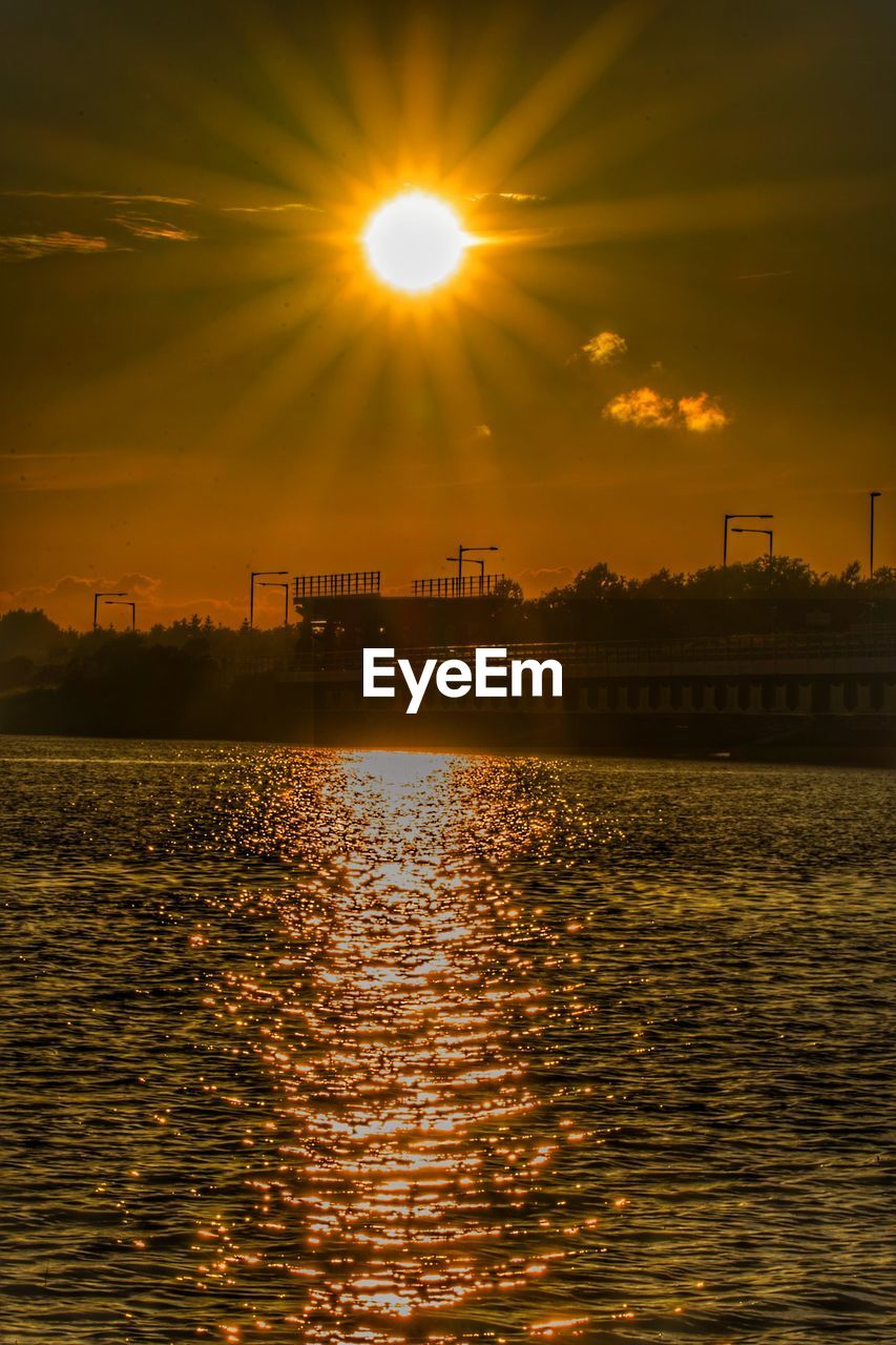 VIEW OF SEA AGAINST SKY DURING SUNSET