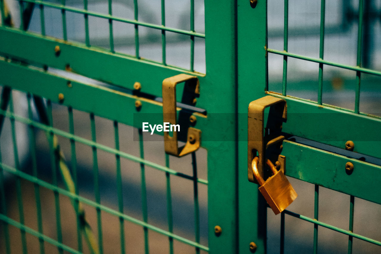 Close-up of locked fence
