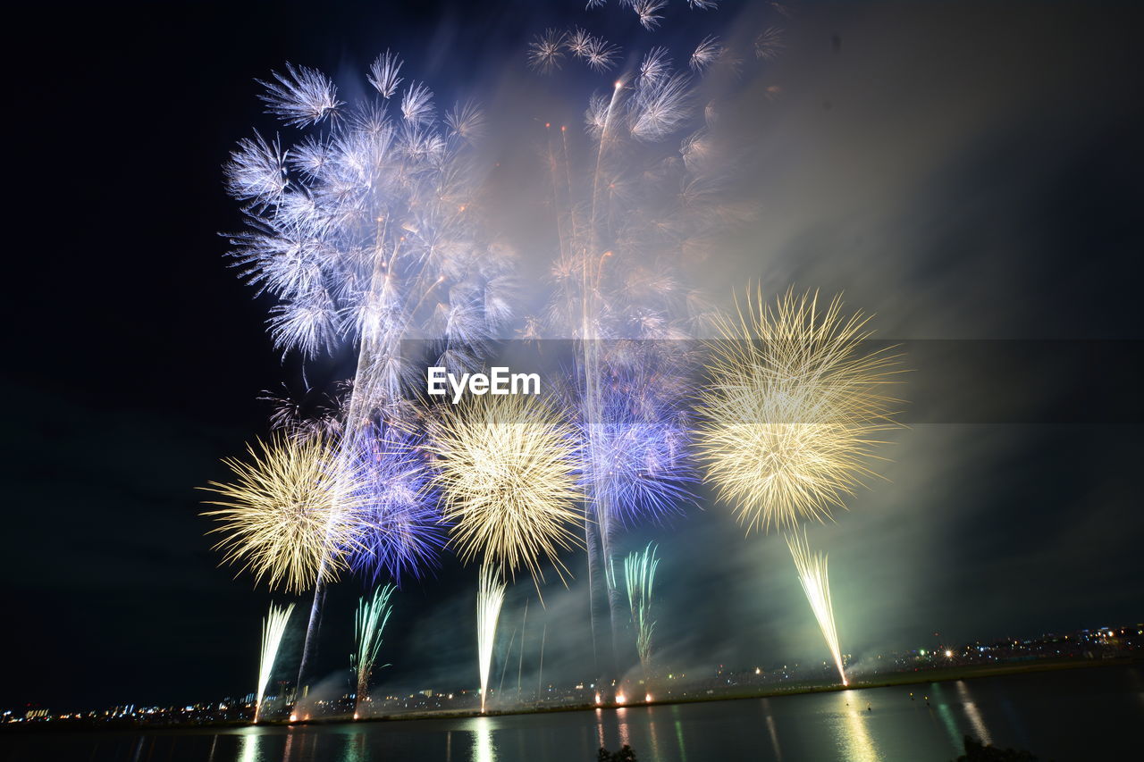 Low angle view of sky illumed with fire crackers