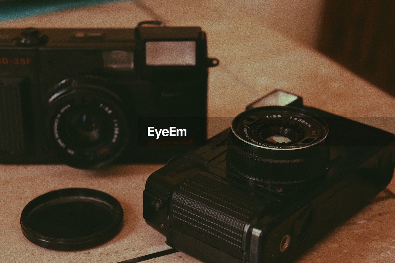 High angle view of camera on table