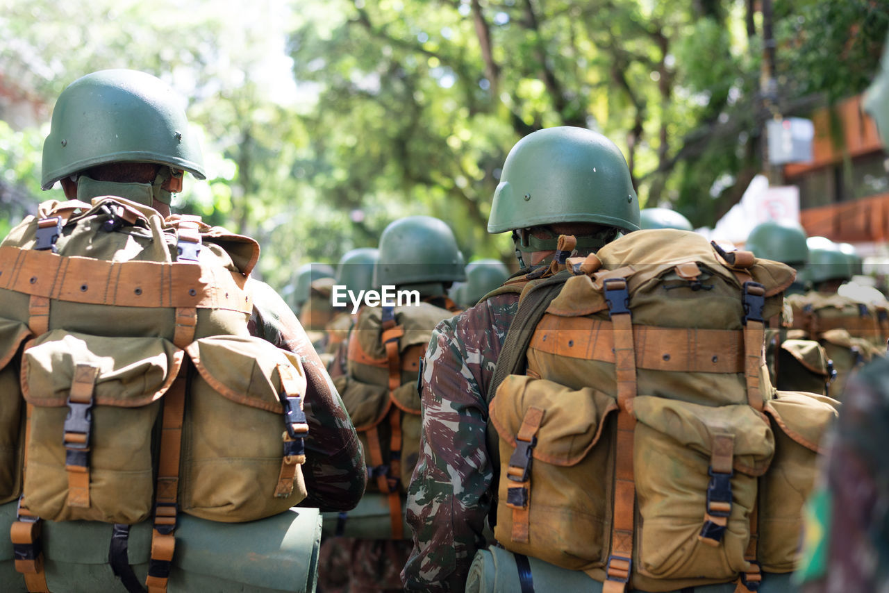 Army soldiers parade with equipment during a tribute to brazilian independence day 